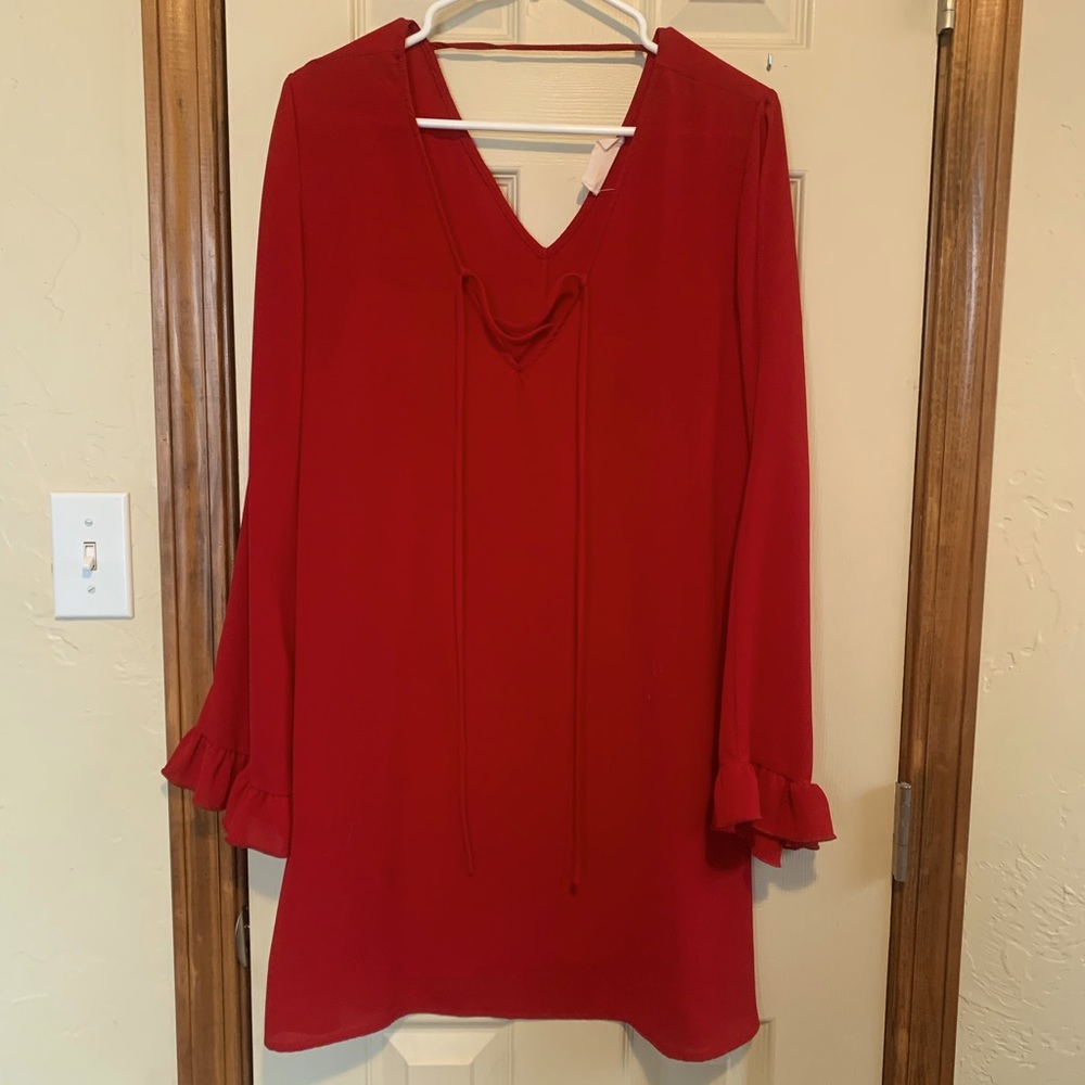 Let Them Eat Cake long sleeve dress with cutout arms and lace up back